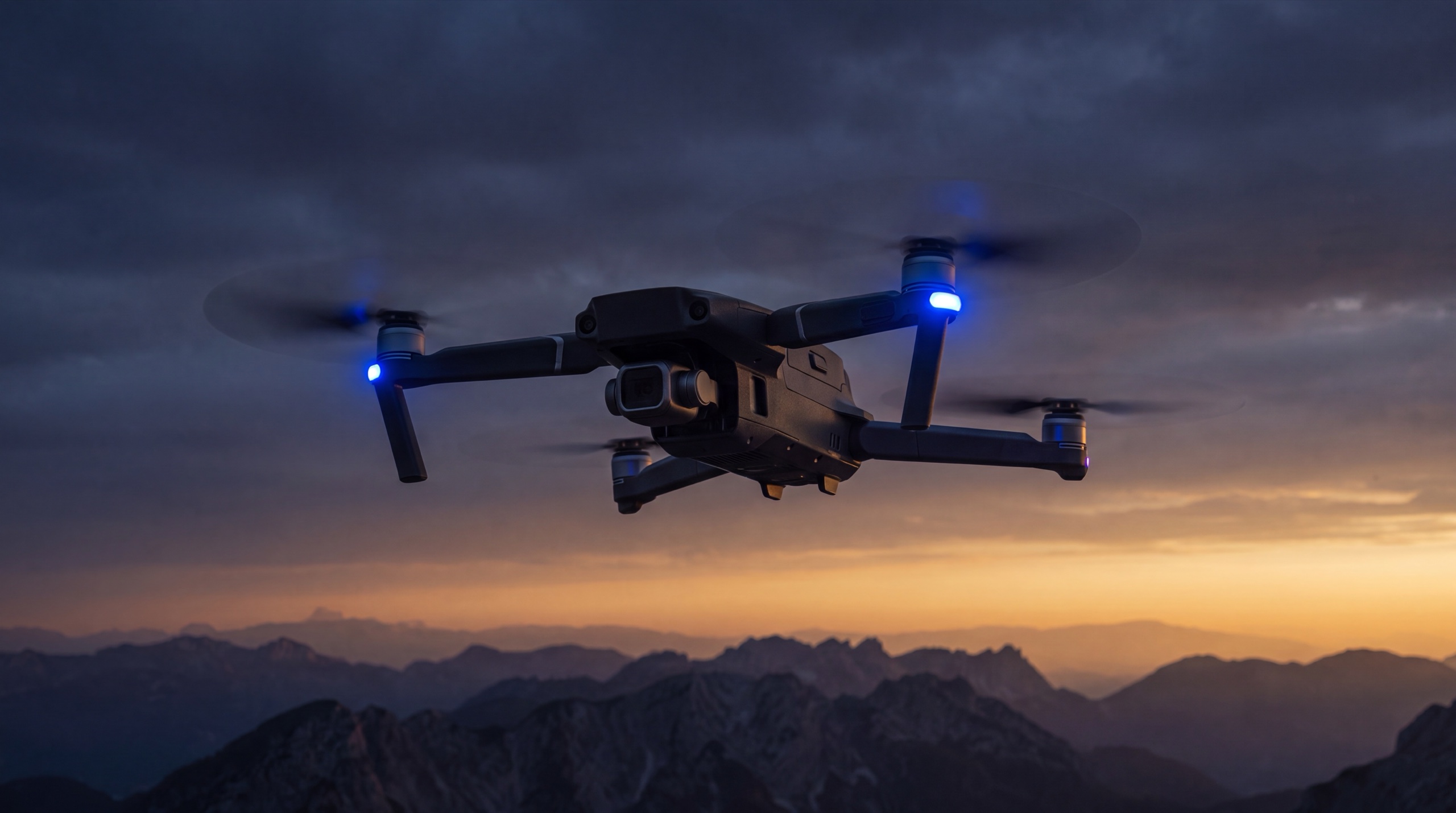 Quadcopter drone in controlled flight at dusk